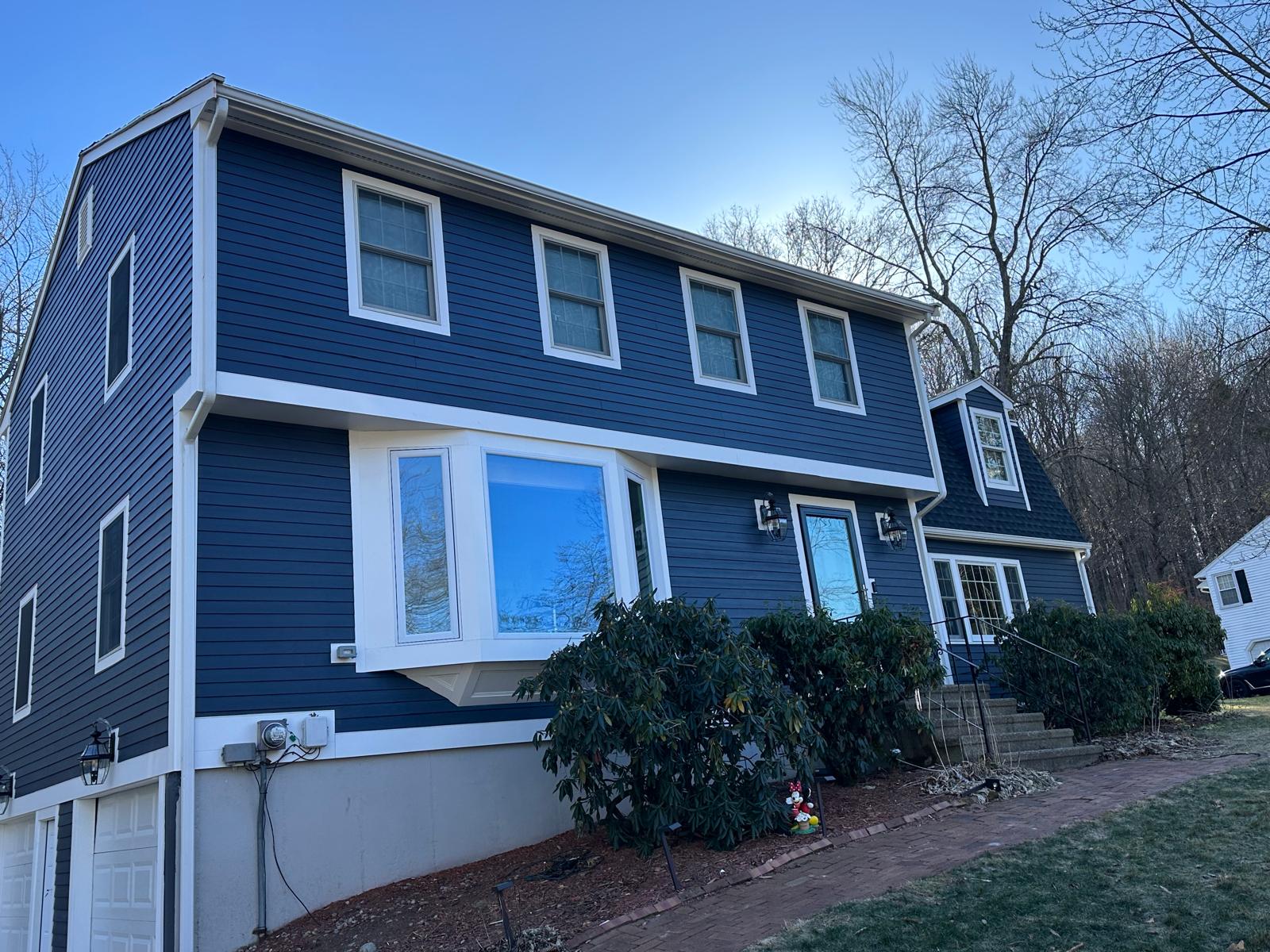 Siding, trim, paint, and curb appeal. — detail